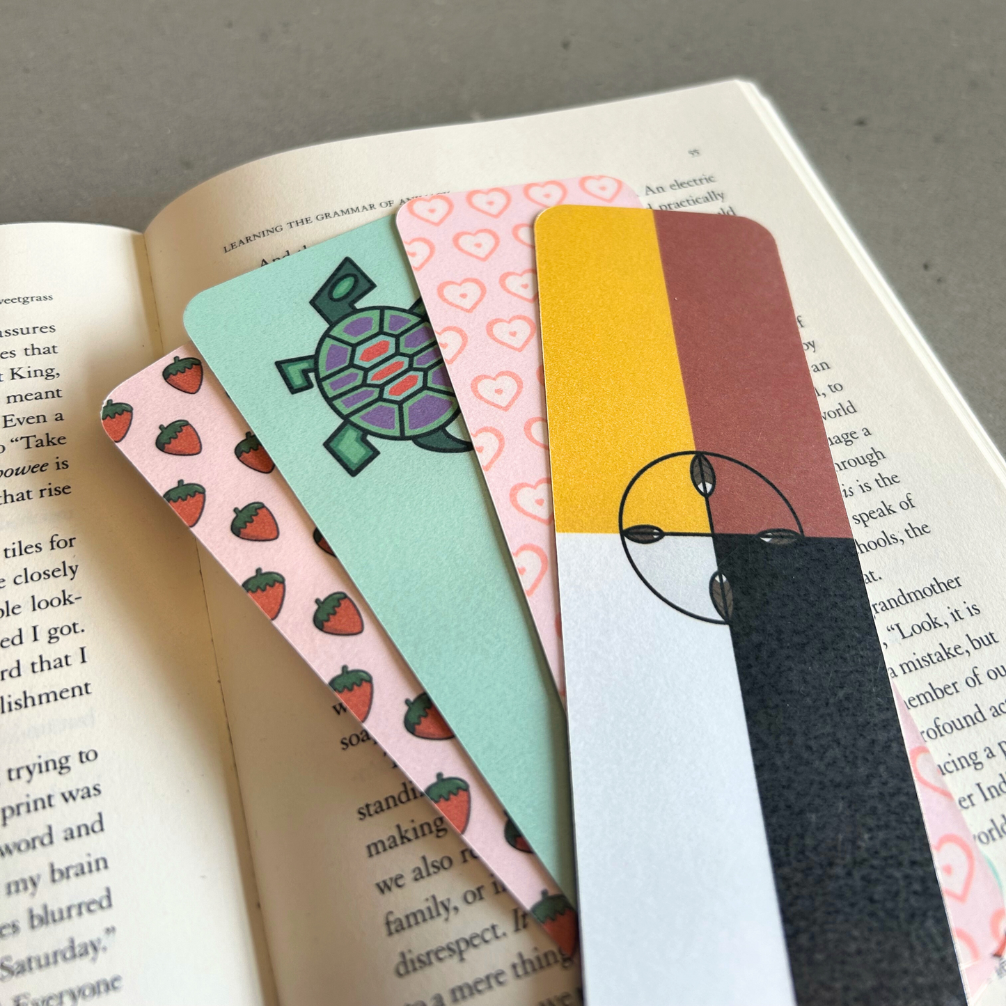 Bookmarks shown fanned out on a book